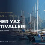 Kemer marinada demirli yelkenliler ve arkada Toros Dağları